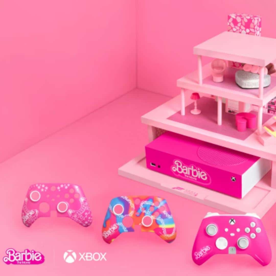 Barbie x XBOX controls. Multiple XBOX controls with Barbie skins and a pink Barbie house