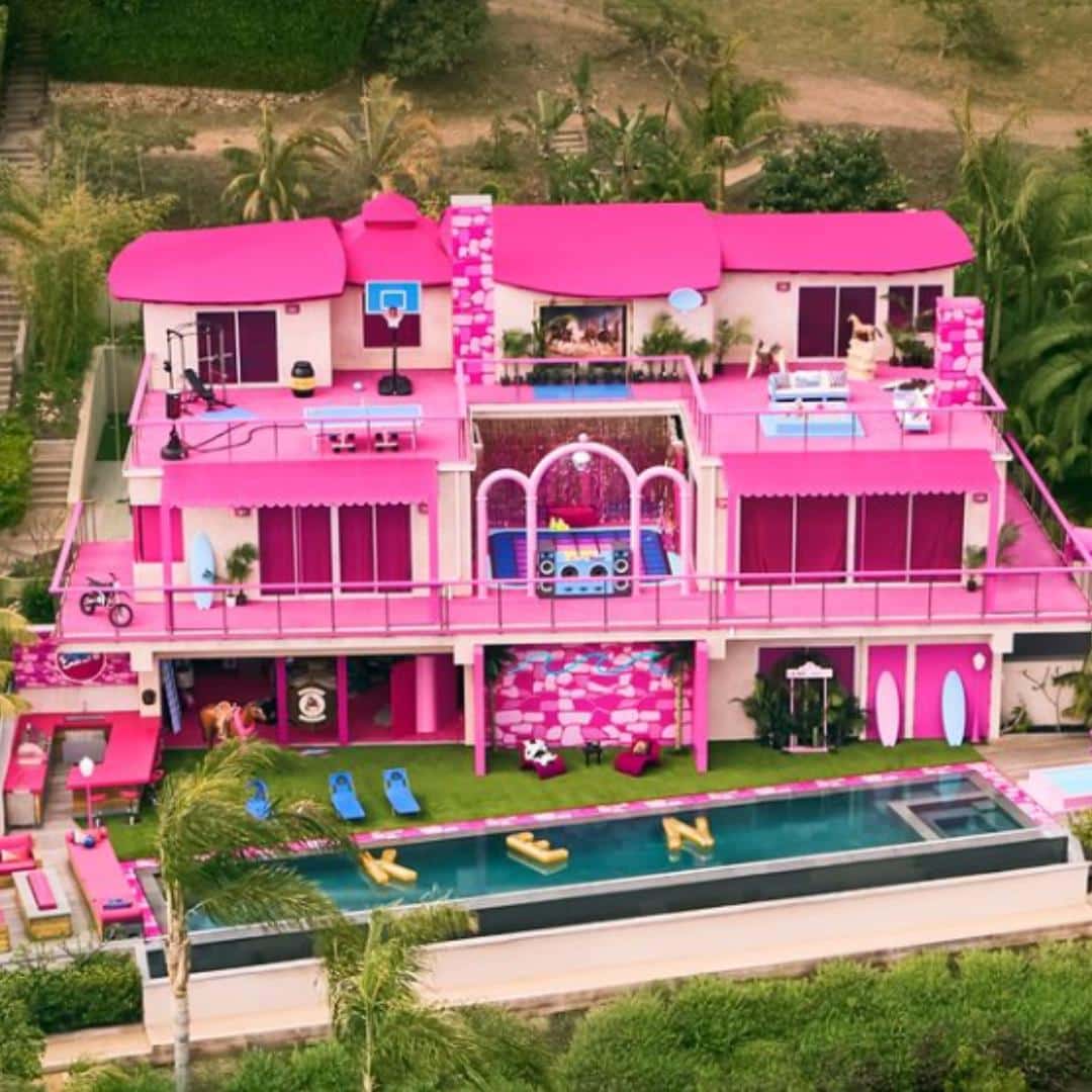 Barbie x Airbnb. A 3 level pink house set in malibu with pool.